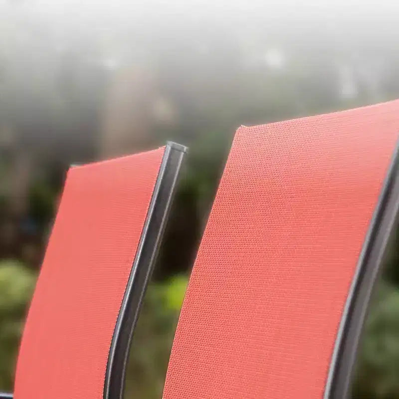 Captiva Designs - Set da pranzo da 7 pezzi per esterni, con tavolo in acciaio effetto legno e sedie fisse in textilene