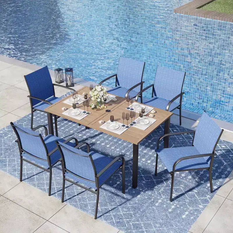 Captiva Designs - Set da pranzo da 7 pezzi per esterni, con tavolo in acciaio effetto legno e sedie fisse in textilene