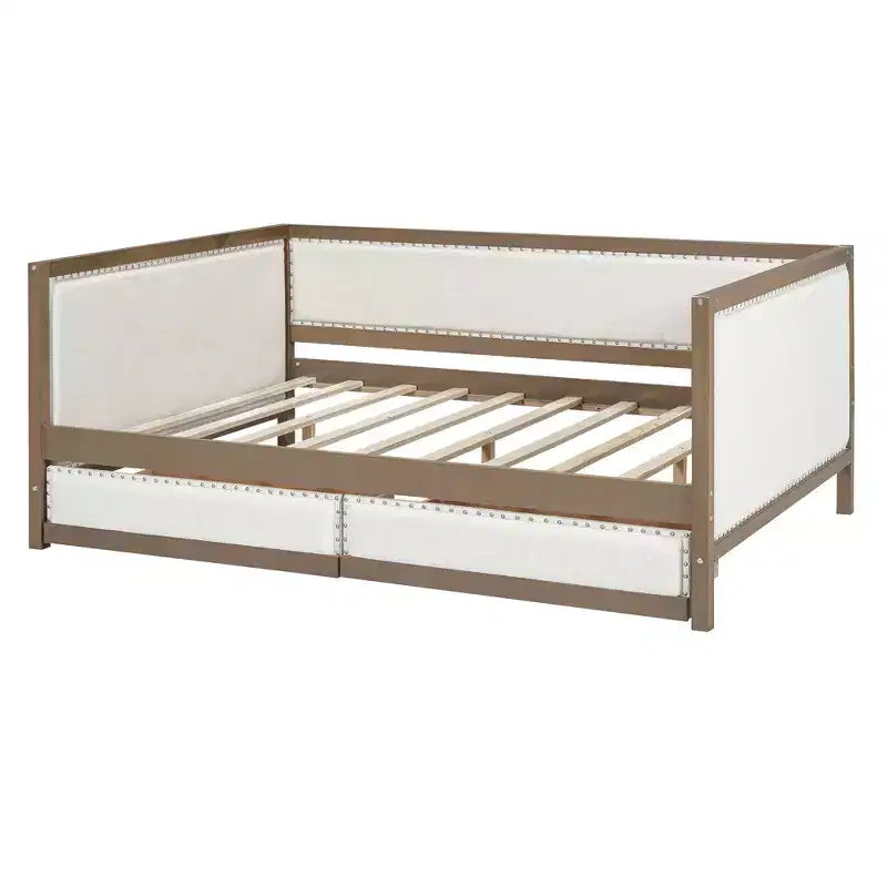 Letto a una piazza e mezza imbottito con letto estraibile e decorazione con borchie