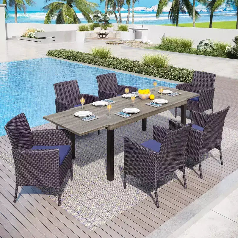 Captiva Designs Set da pranzo da 7 pezzi in acciaio allungabile e sedie in rattan con braccioli a mezzaluna per esterni