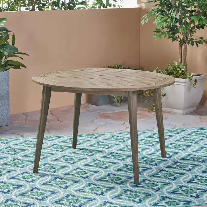 Tavolo da pranzo rotondo Okak Elegent per esterni con struttura e piano in legno di acacia, tavolo da pranzo minimalista per patio, tavolino da esterno per giardino