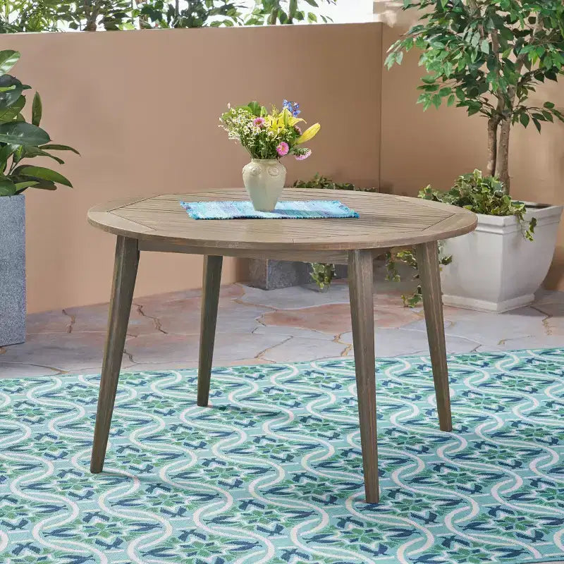 Tavolo da pranzo rotondo Okak Elegent per esterni con struttura e piano in legno di acacia, tavolo da pranzo minimalista per patio, tavolino da esterno per giardino