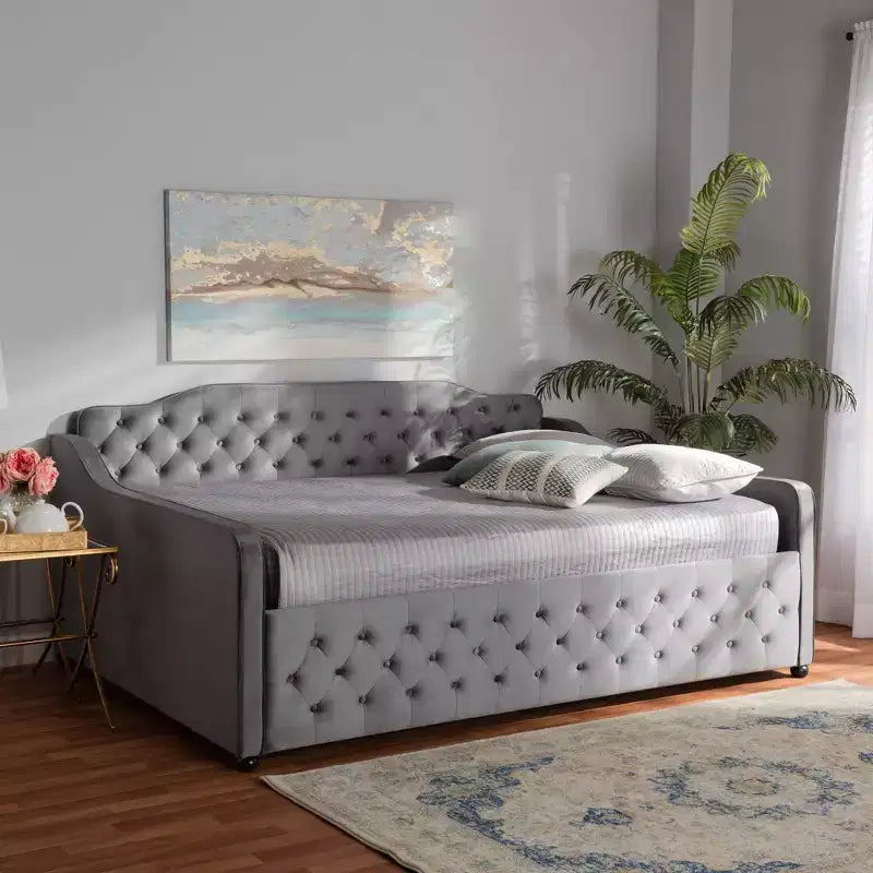 Divano letto Freda rivestito in tessuto velluto con bottoni capitonné - Baxton Studio