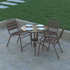 Tavolo rotondo Emma and Oliver 31.5 in metallo e vetro temperato con superficie liscia dal design a increspature