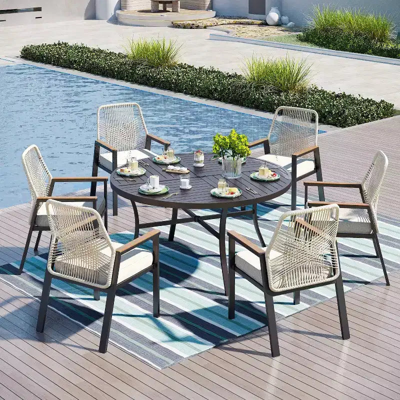 Captiva Designs Set da pranzo da 7 pezzi con tavolo rotondo in acciaio e sedie girevoli in vimini con cuscini spessi